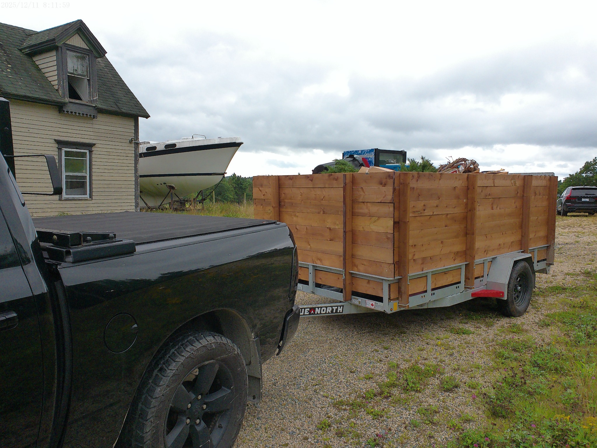 Pickup truck and high-sided trailer used for local hauling